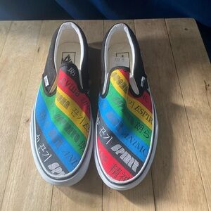 Women’s Black vans with different languages on them